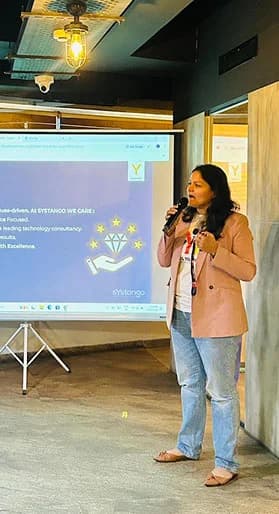 Woman presenting to team